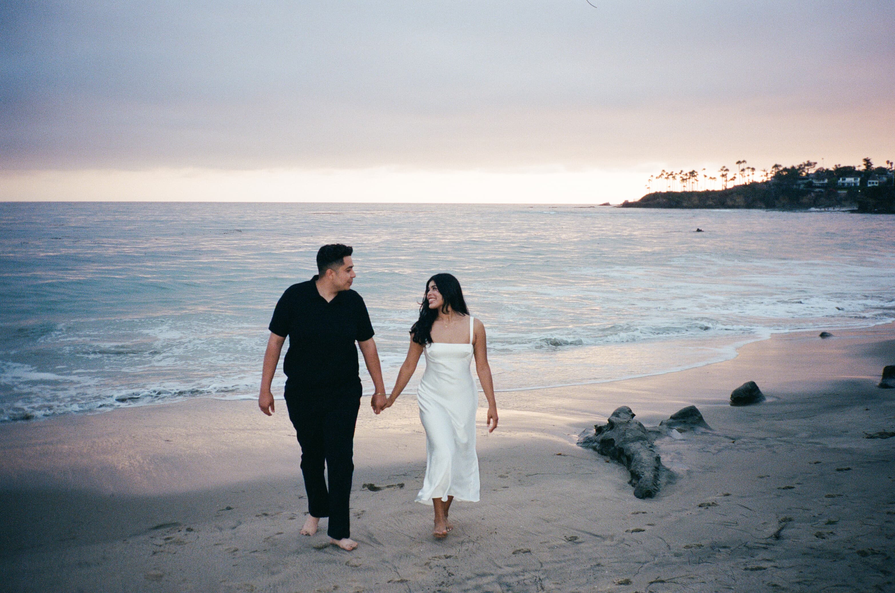 Luis and Mishell engagement photo by the shoreline