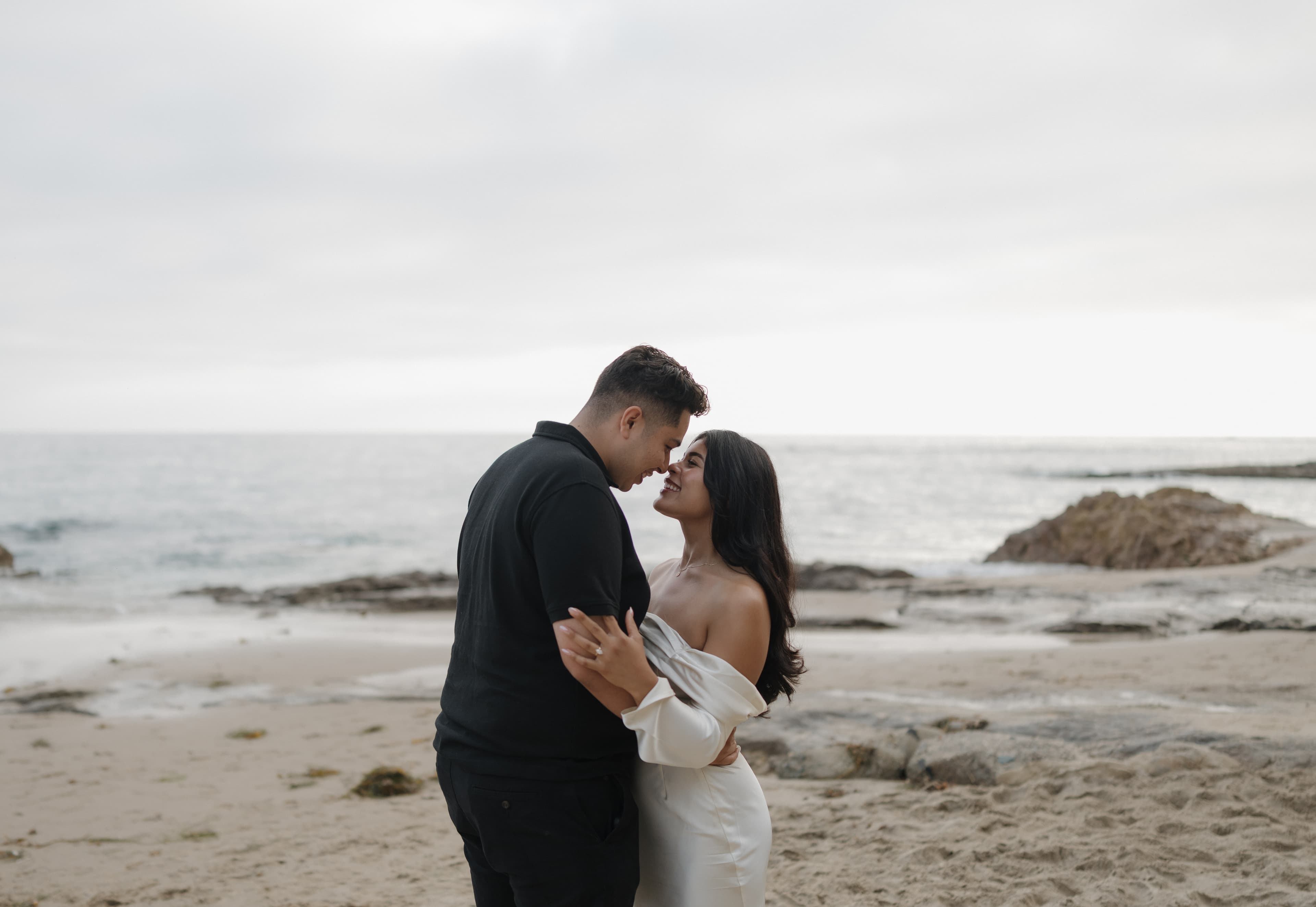 Luis and Mishell engagement photo on the beach